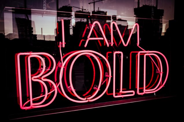 A neon sign that says, "I am bold."